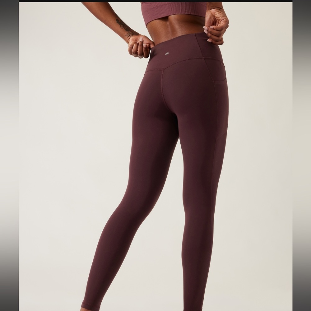 Athleta Salutation Stash tight, M, EUC